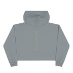 Back of a crop hoodie showing seven chakra symbols down the spine
