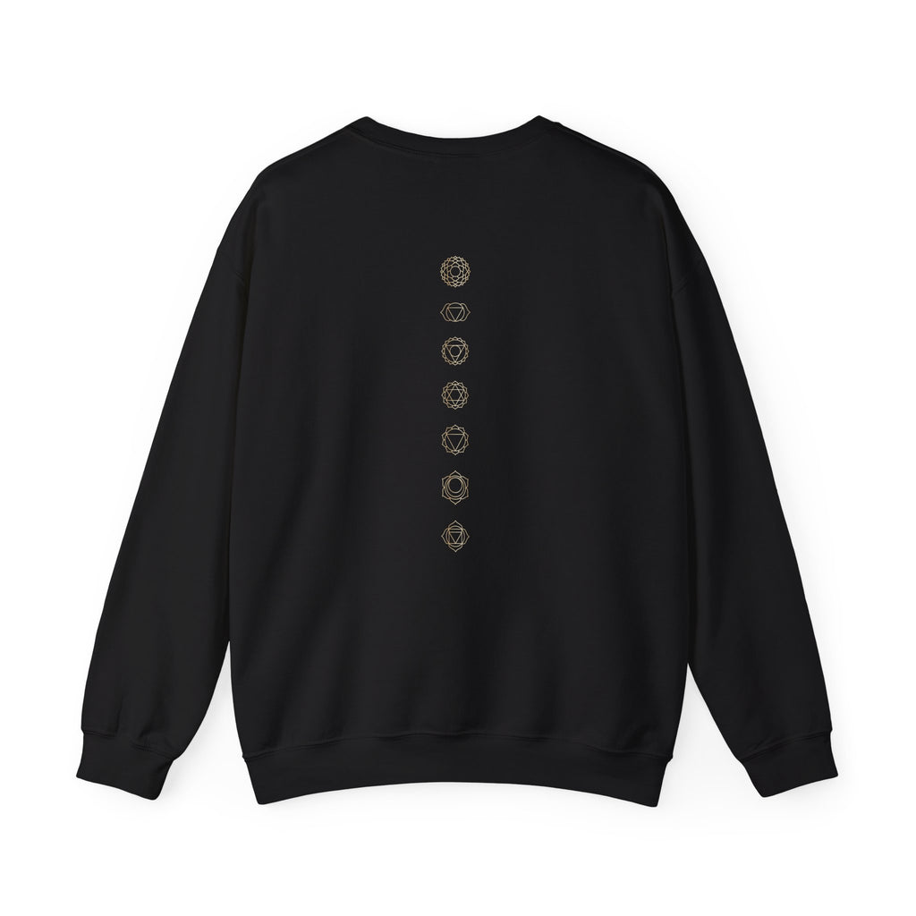 Back of a crewneck showing seven chakra symbols down the spine