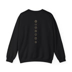 Back of a crewneck showing seven chakra symbols down the spine