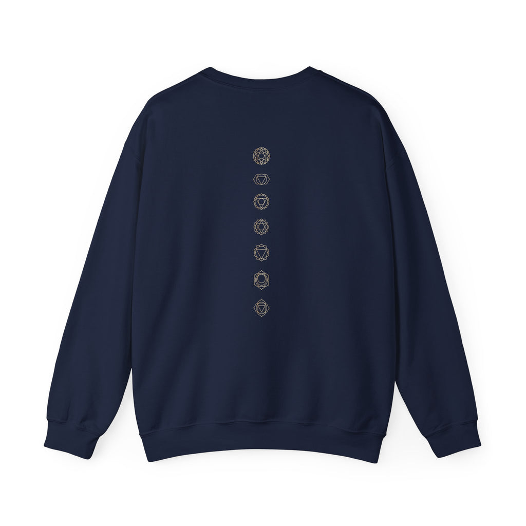 Back of a crewneck showing seven chakra symbols down the spine