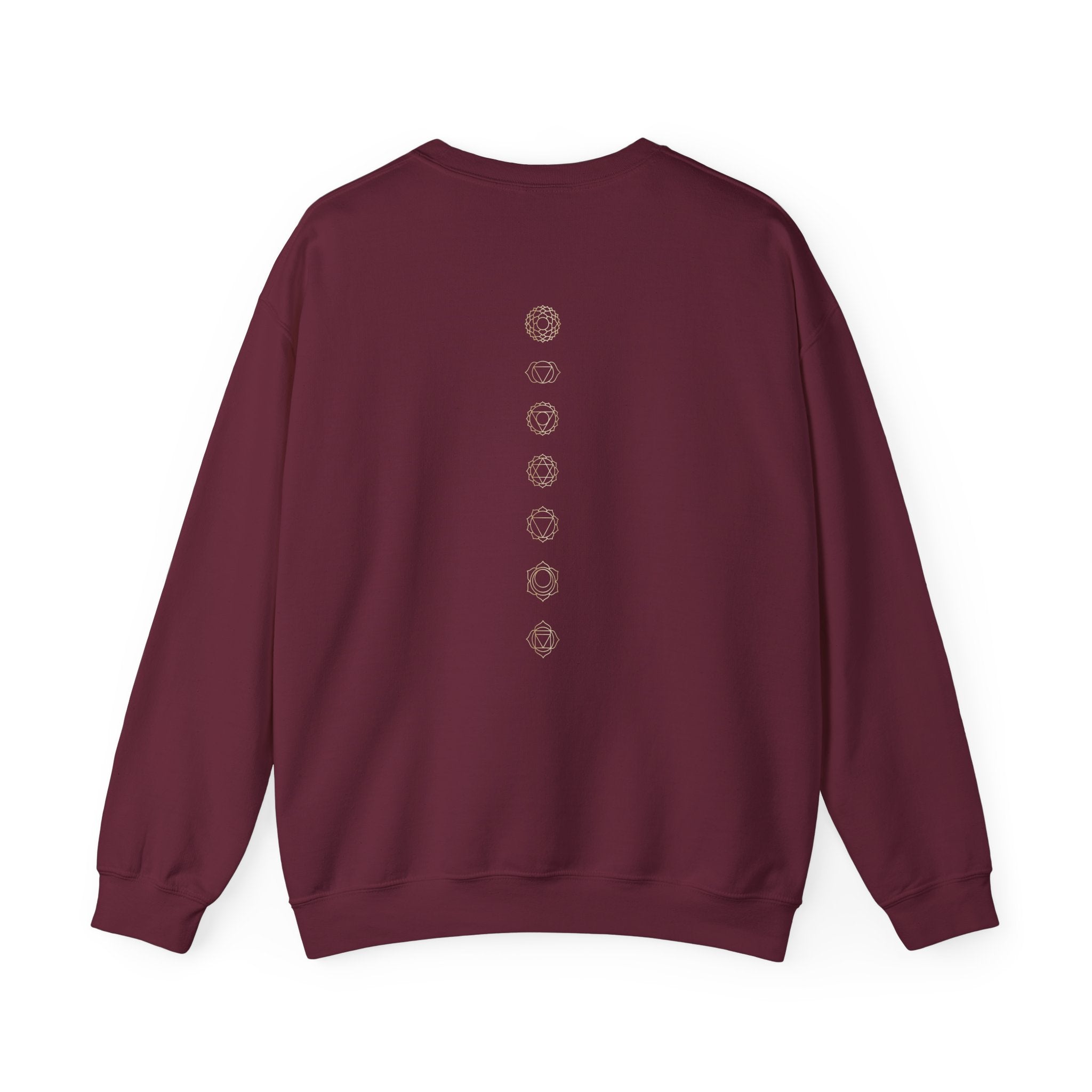 Back of a crewneck showing seven chakra symbols down the spine