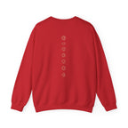 Back of a crewneck showing seven chakra symbols down the spine