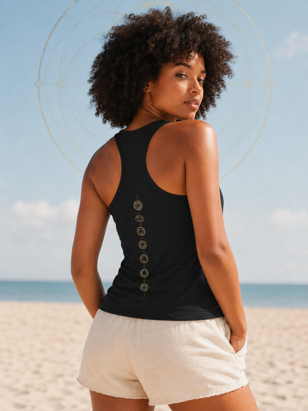 Back of a racerback tank showing seven chakra symbols down the spine