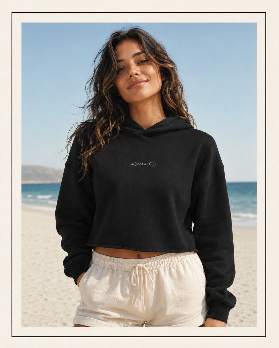 Front of a crop hoodie showing a sacred geometry symbol in the front aligned AF