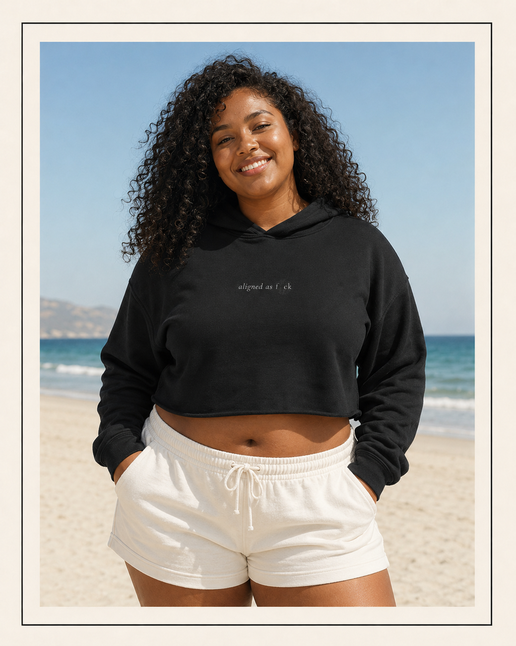 Front of a crop hoodie showing a sacred geometry symbol in the front aligned AF