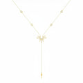 Gold necklace with star pendant and measurement details on a white background