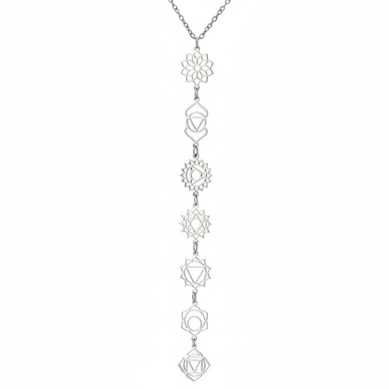 Silver necklace with geometric pendants on a white background