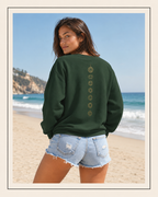 Back of a crewneck showing seven chakra symbols down the spine