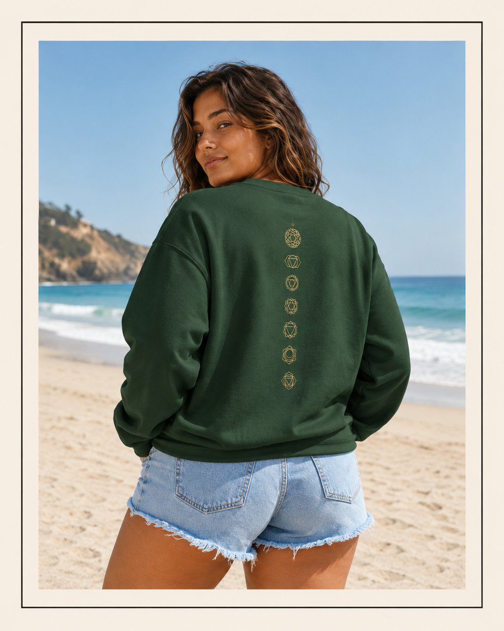 Back of a crewneck showing seven chakra symbols down the spine